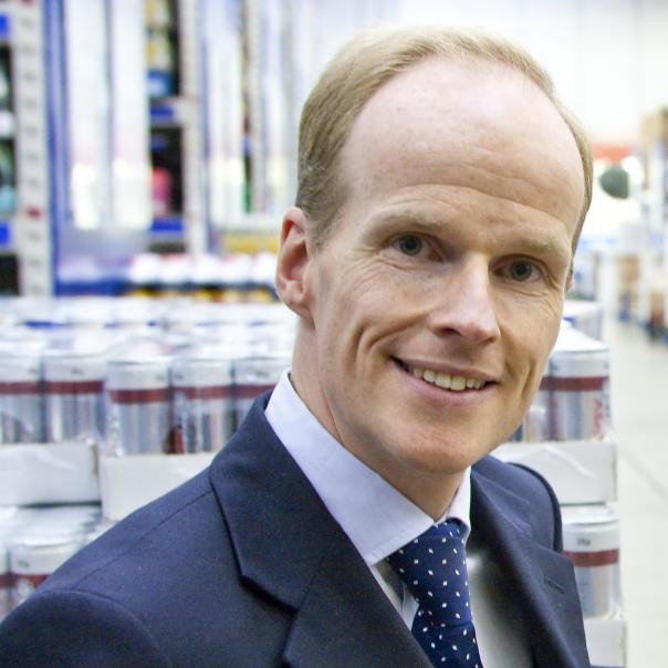 Tesco Booker merger Charles Wilson chief executive